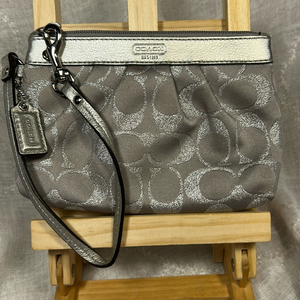 NWOT Coach silver wristlet wallet with iconic tag